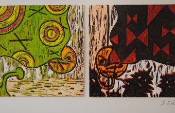 abstract images, one of a green backdrop with yellow circles and the other is a black and red checkerboard