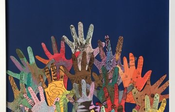 dozens of different coloured hands all reaching towards a star in the sky