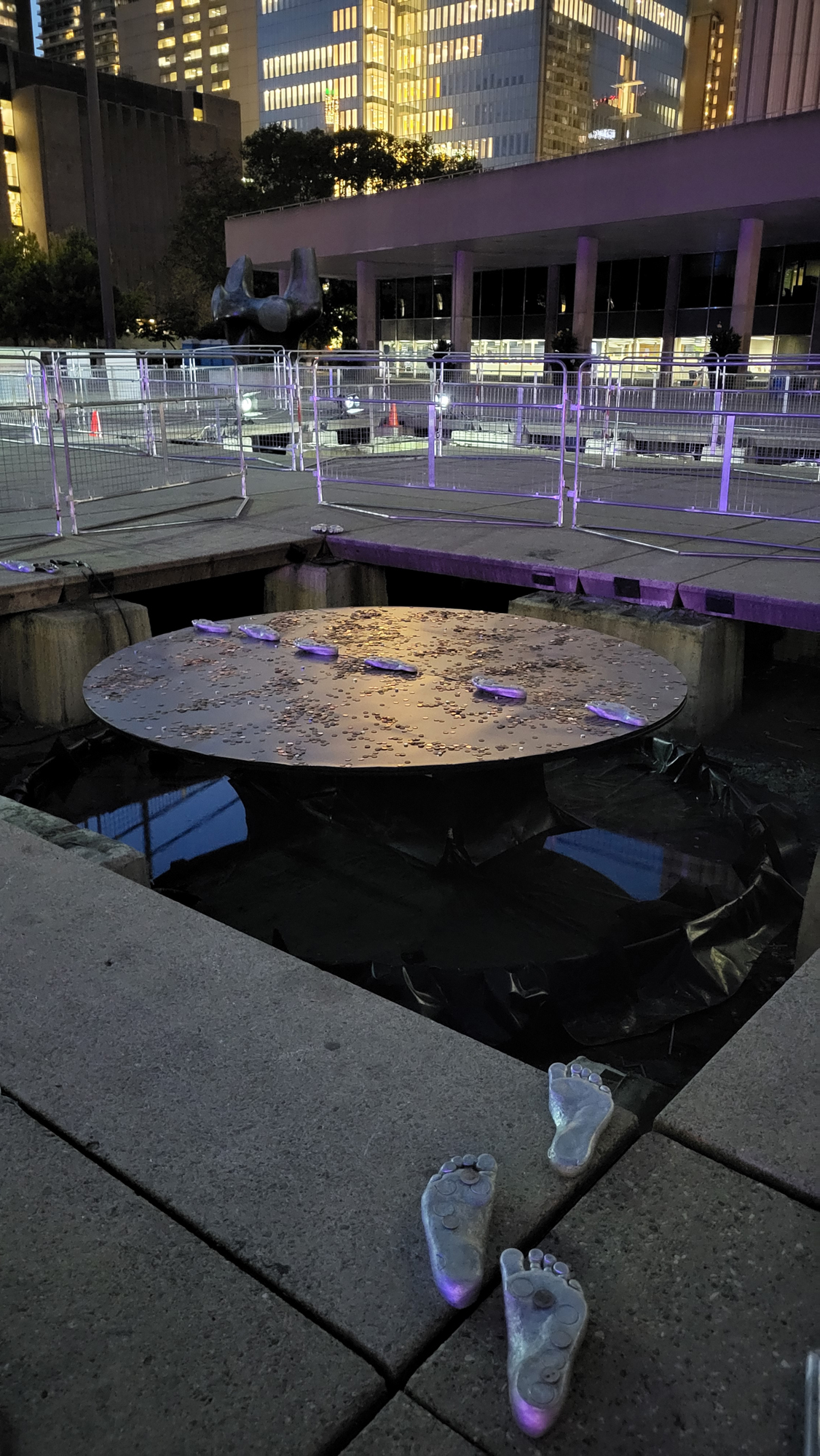Nathan Philips Square deconstructed as part of the artwork Wellsping by Jenine Marsh. A close-up shot of the detritus and gold f