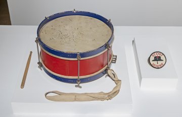 Photo of a single drum with a small fabric patch 