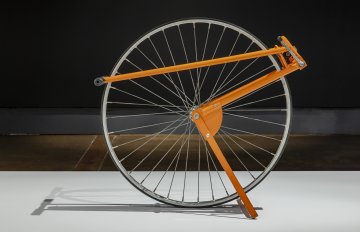 Sculpture of a bicycle wheel measuring device