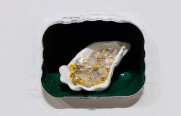 A small gathering of objects serving as an offering