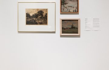 Installation shto of three artworks mounted closely on a white wall